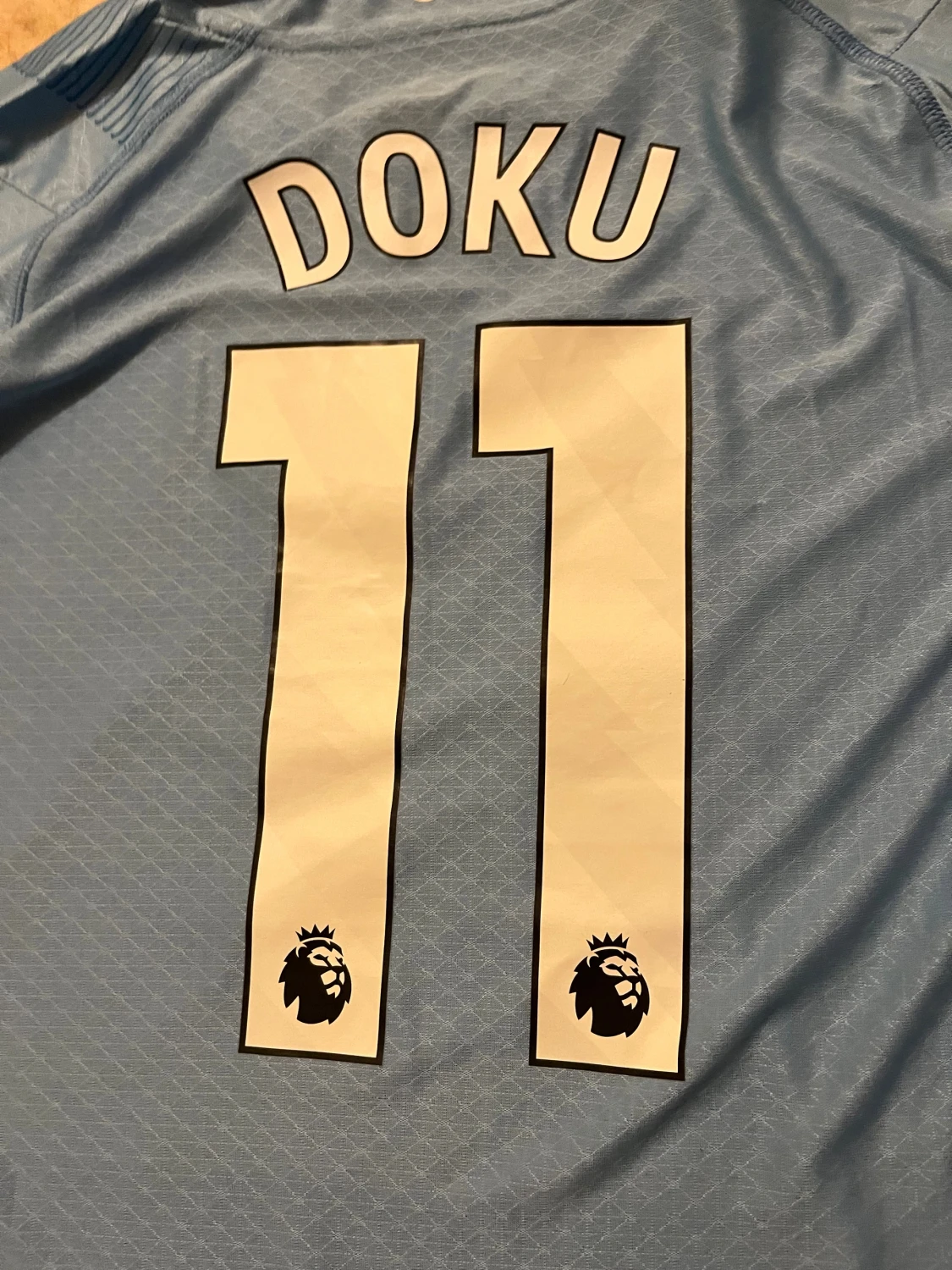 Manchester City matchtröja Puma. Jérémy Doku 11 - 5