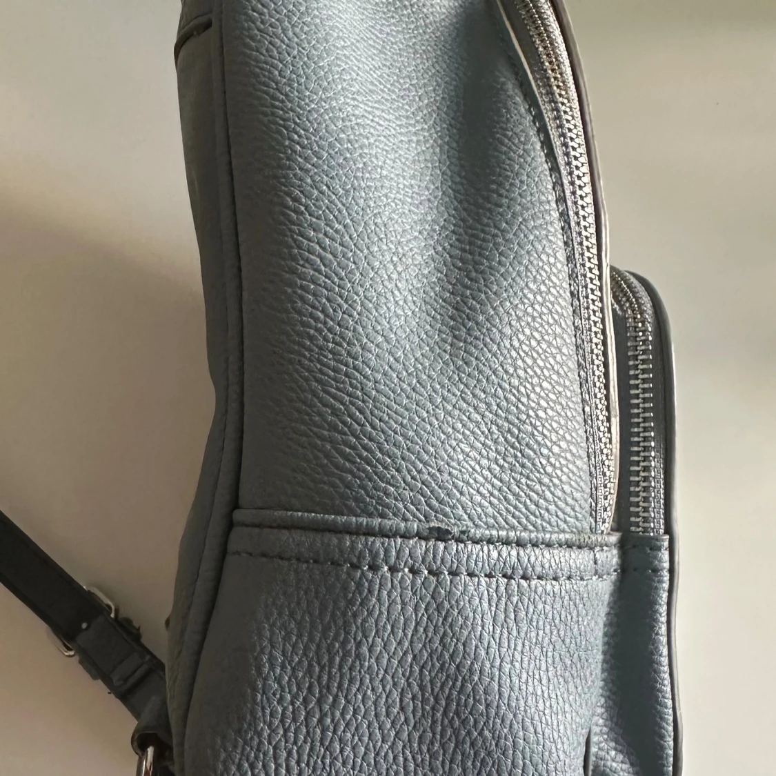 Ljusblå ryggsäck  - 2