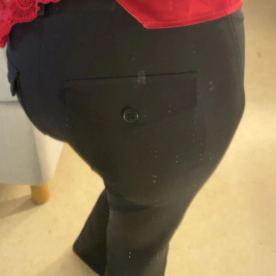 Svarta kostymbyxor med fickor