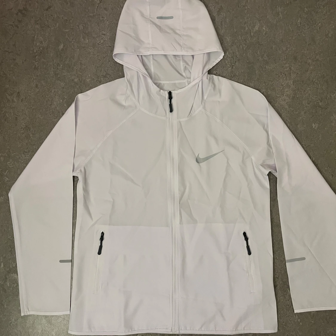 Vit Nike Miller vindjacka