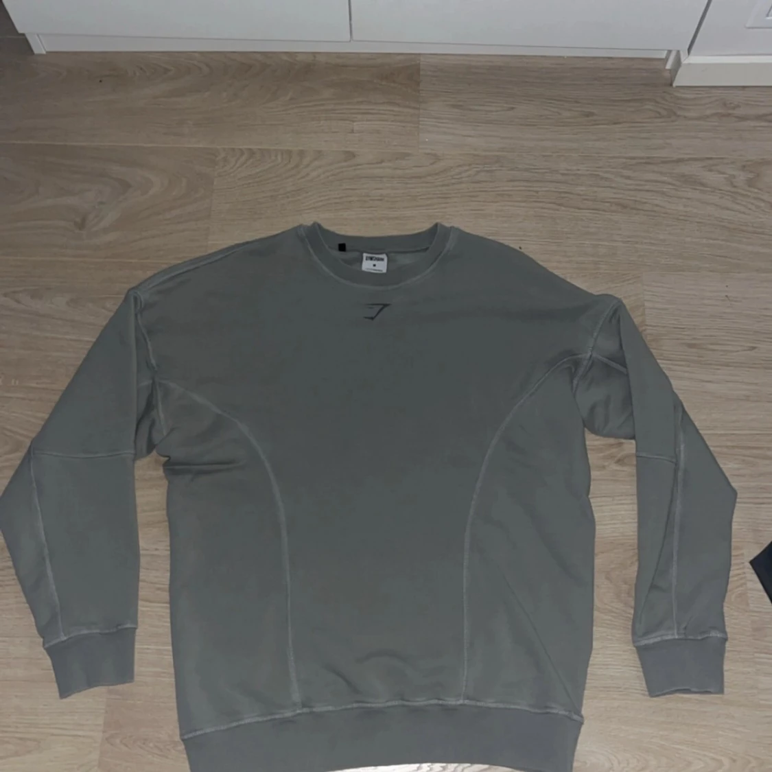 Grå sweatshirt från Gymshark