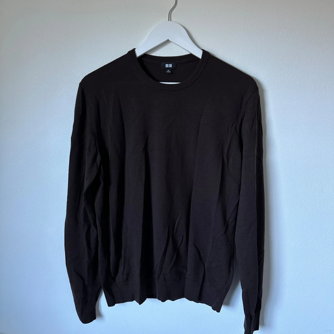 Mörkbrun ulltröja från Uniqlo, M