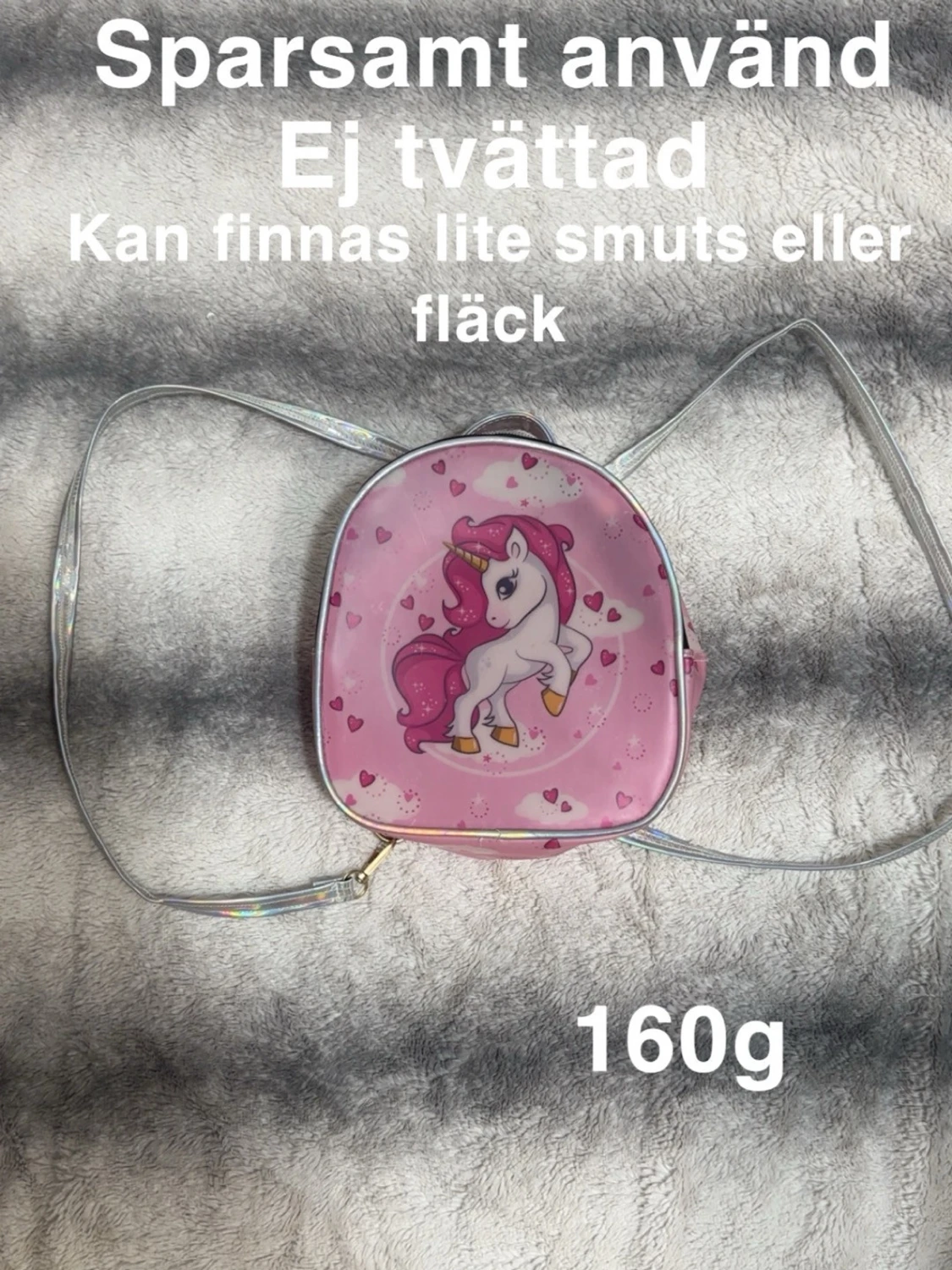 Rosa ryggsäck med enhörning