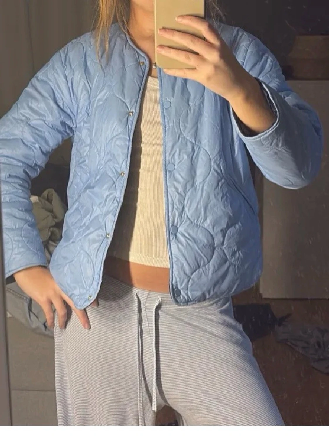 Ljusblå quilitad jacka