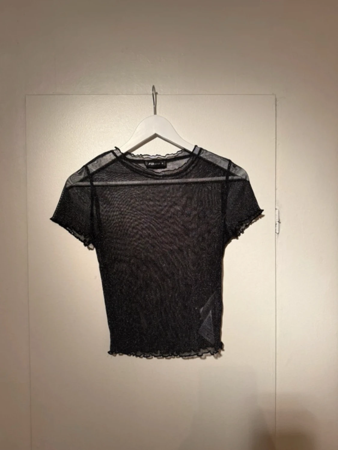 Glittrig mesh topp från F.A. Sister - 1