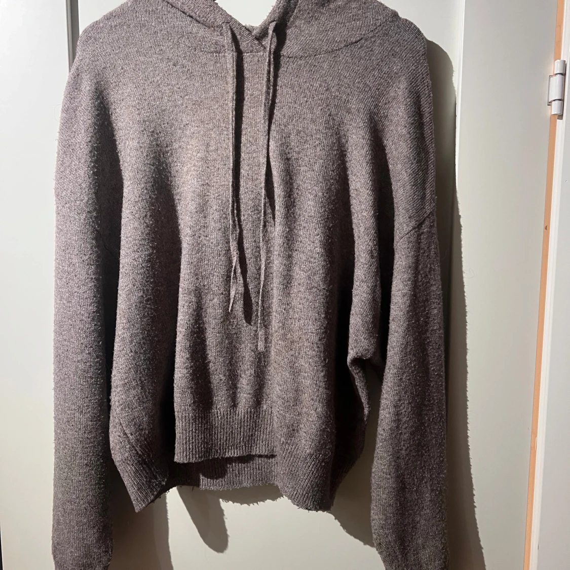 Stickad hoodie från Lindex