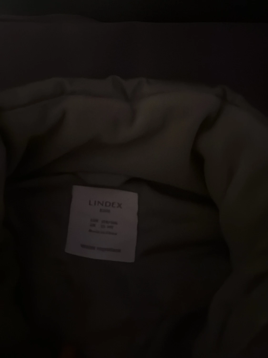 Beige dunväst från Lindex - 1