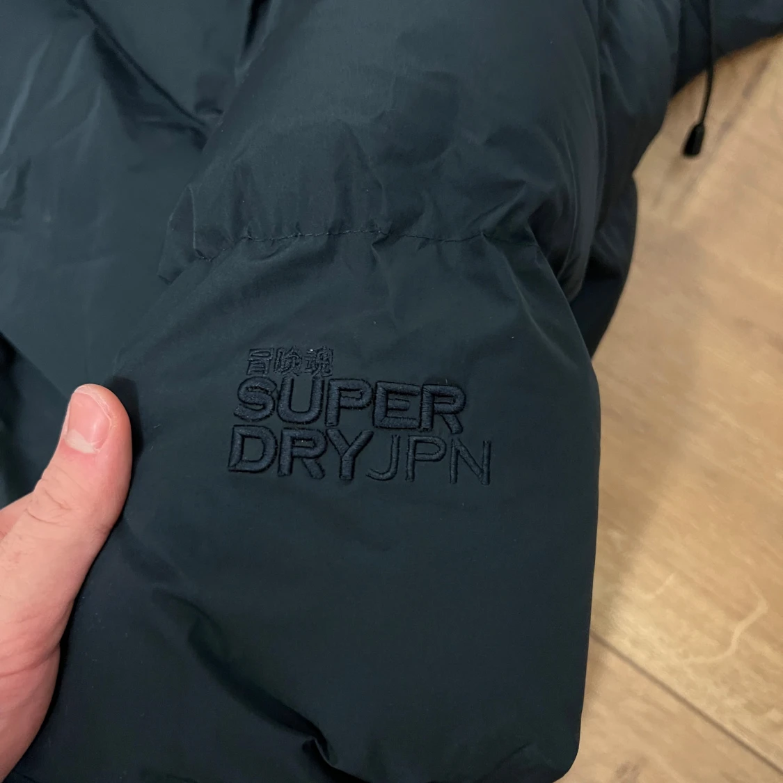 Mörkblå lång pufferjacka Superdry - 2