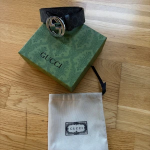 Svart GG bälte  - Säljer detta GG bälte 105cm långt, kommer med allt på bild.