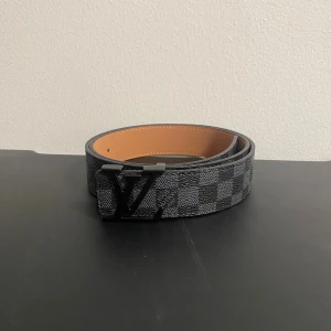 Svart rutigt bälte  - Svart rutigt bälte