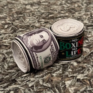 No Boxing No Life boxningslindor - Säljer ett par boxningslindor från No Boxing No Life med dollartryck. Lindorna har ett coolt mönster av hundradollarsedlar längs hela bandet. 5 meter och helt nya, har inte ens rullat ut dem.