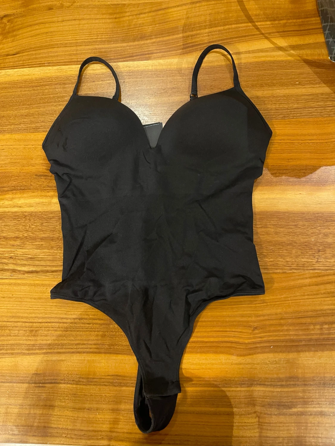 Svart body från H&M, storlek M