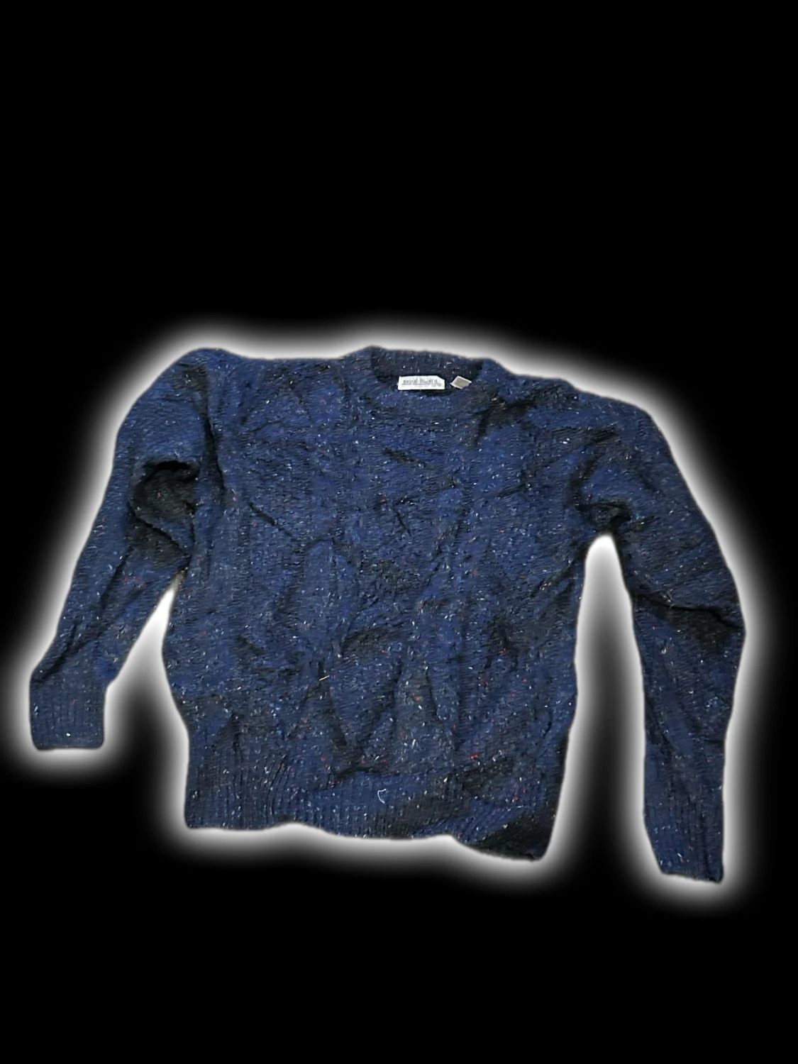 Mörkblå stickad tröja med kabelmönster