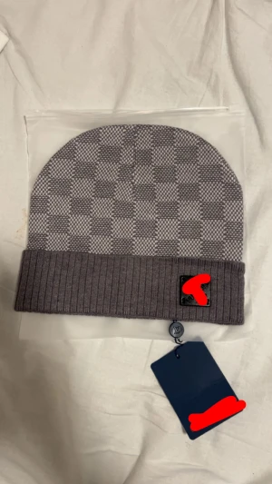 Grå mössa - Grå mössa