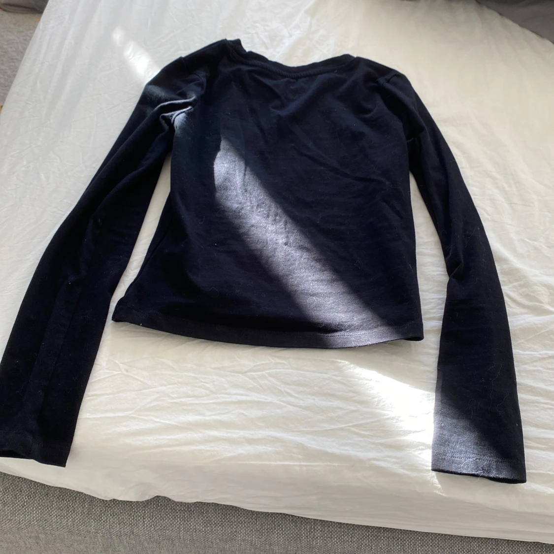 Svart långärmad topp från H&M - 1