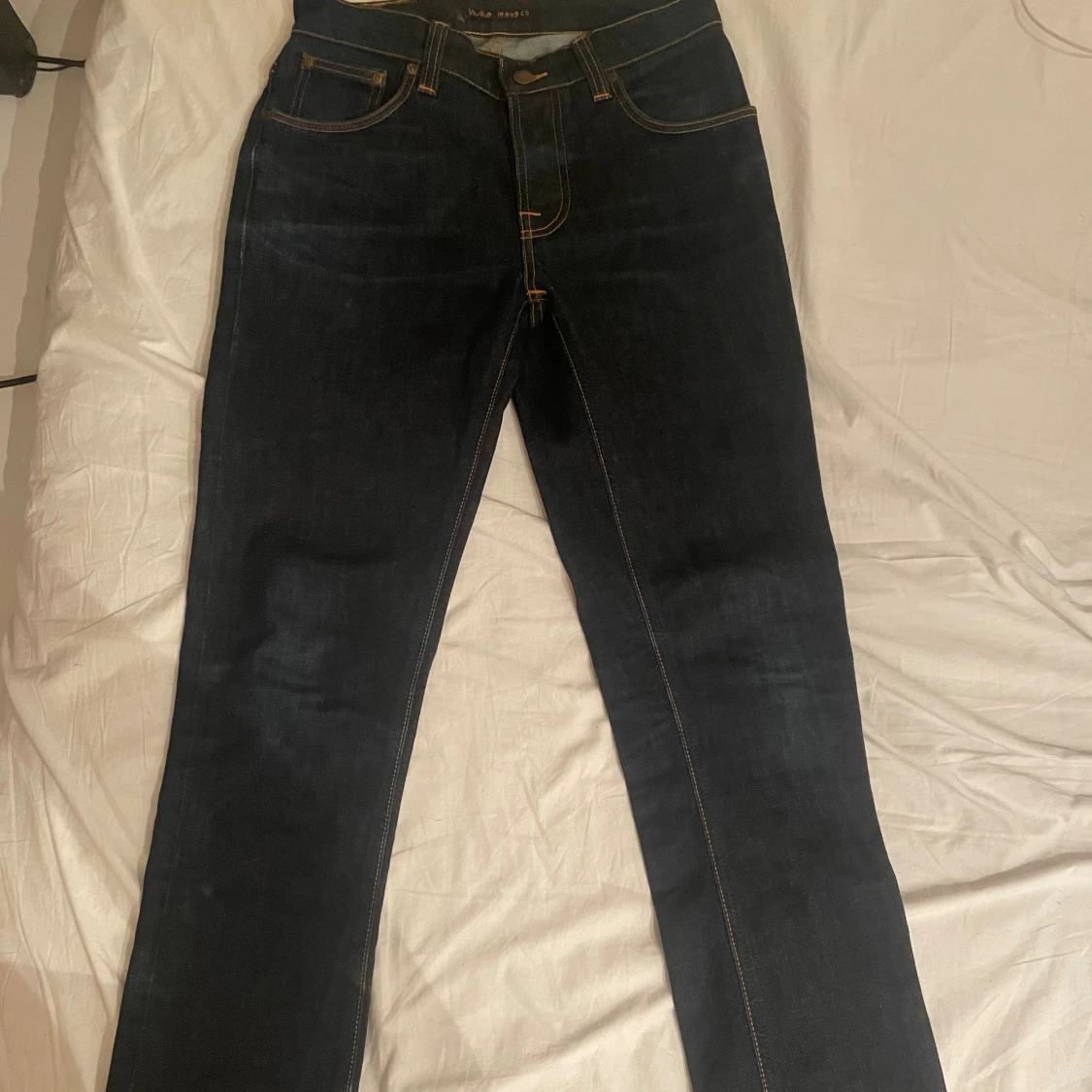 Mörkblå selvedge jeans från Nudie Jeans - 1