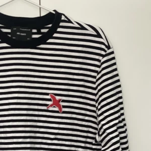 Långärmad tröja Axel Arigato - Långärmad tröja som knappt är använd. Liten i storleken, står som M Herr med snarare M Dam.  