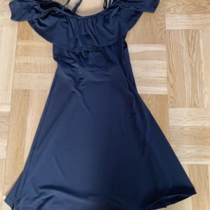 Klänning - Aldrig använd och har prislapp kvar.