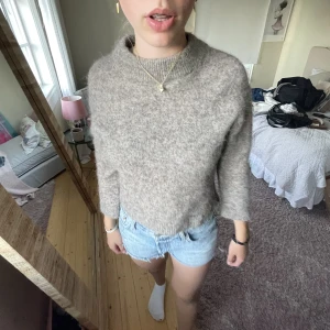 Stickad tröja med trekvartsärm  - Passar Xs-M