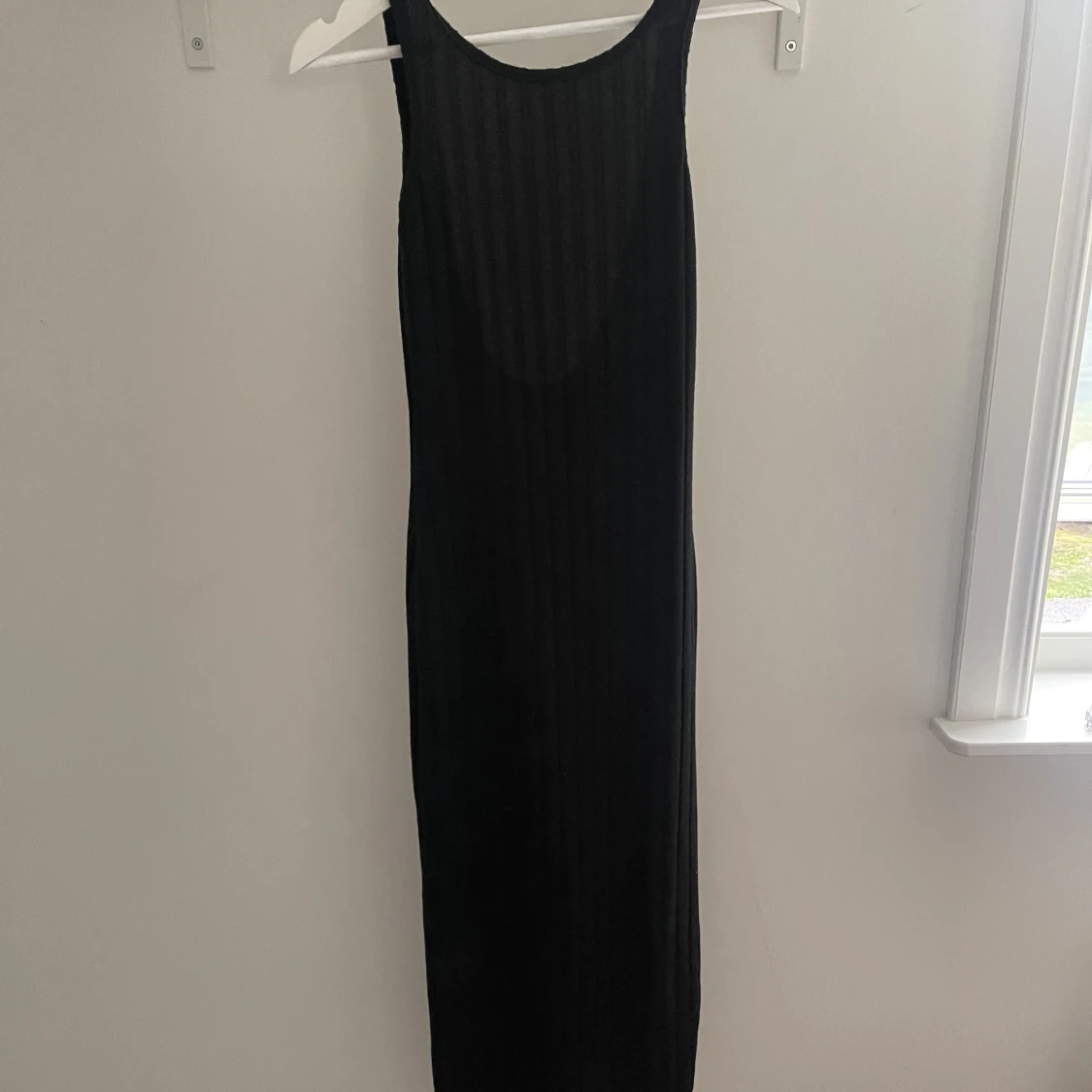 Lång stickad klänning