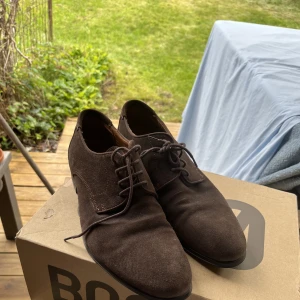 Mockaskor - Bruna mockaskor från Lloyd