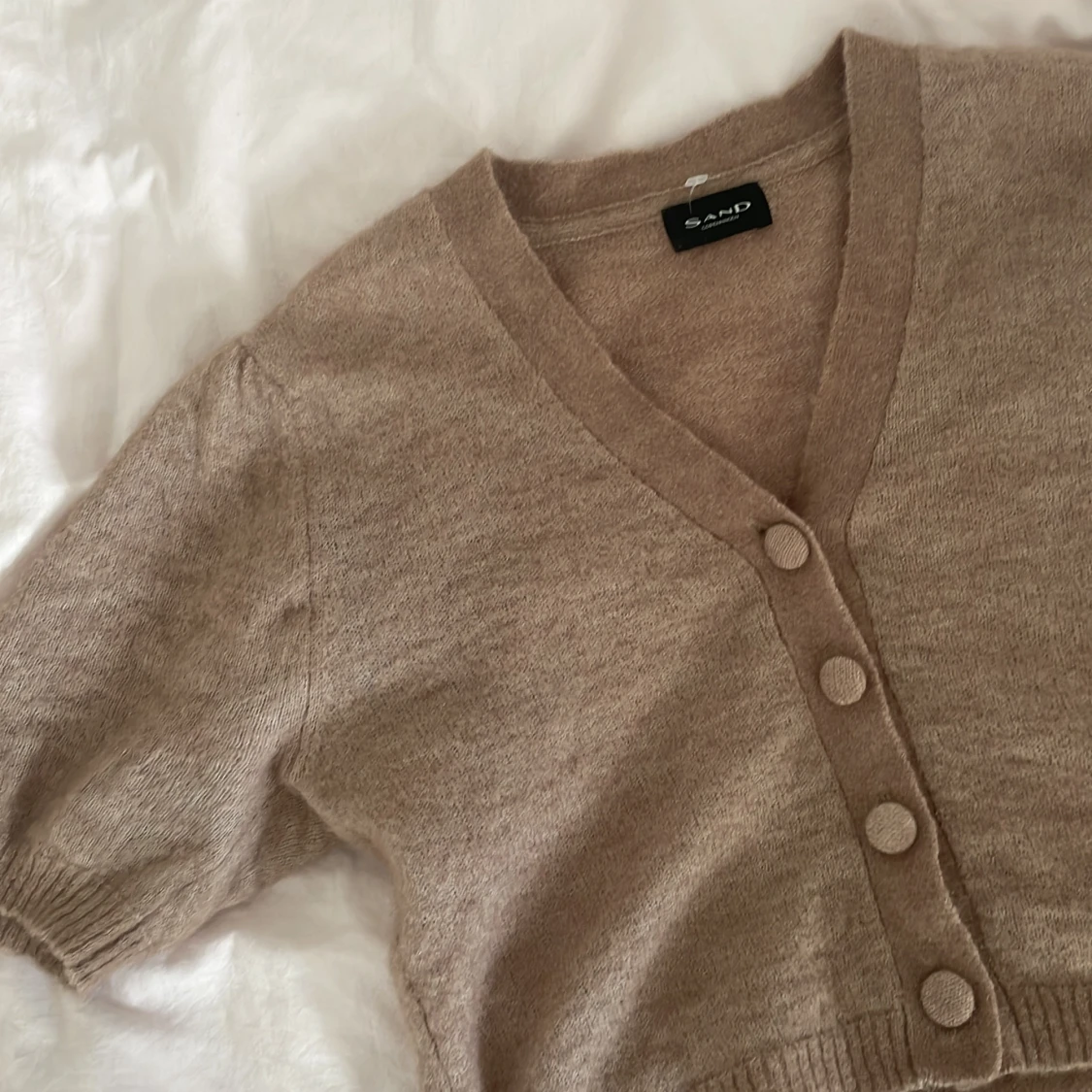 Stickad kortärmad kofta - 91