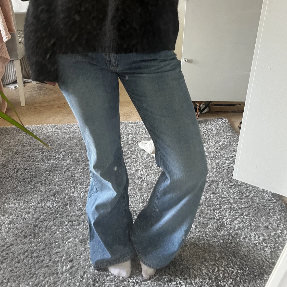 Lågmidjade ljusa bootcut-jeans  - 91