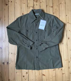 Soul Frontiere Shirt (XS/44)  Overshirt from Our Legacy in a medium weight cotton with 100% horn buttons. Perfect as a layering piece. New with tags. 