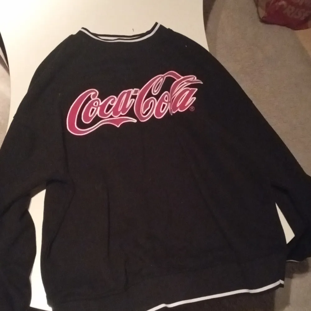 En fin svart Coca Cola hoodie . Hoodies.
