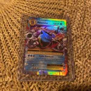 M Blastoise EX-Holo 2016 Pokemon TCG XY Evolutions #22/108 - Kortet har väldigt lite repor och kommer med plast hållare,Pokémon kortet är knappt använt och i bra kondition