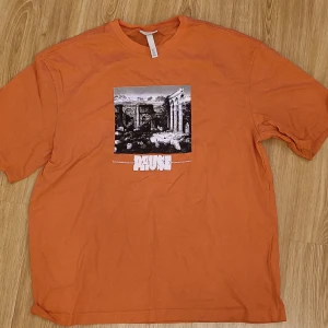 Orange t-shirt  - Bra skick