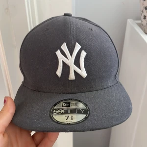 Keps - En 59fifty new era keps grå