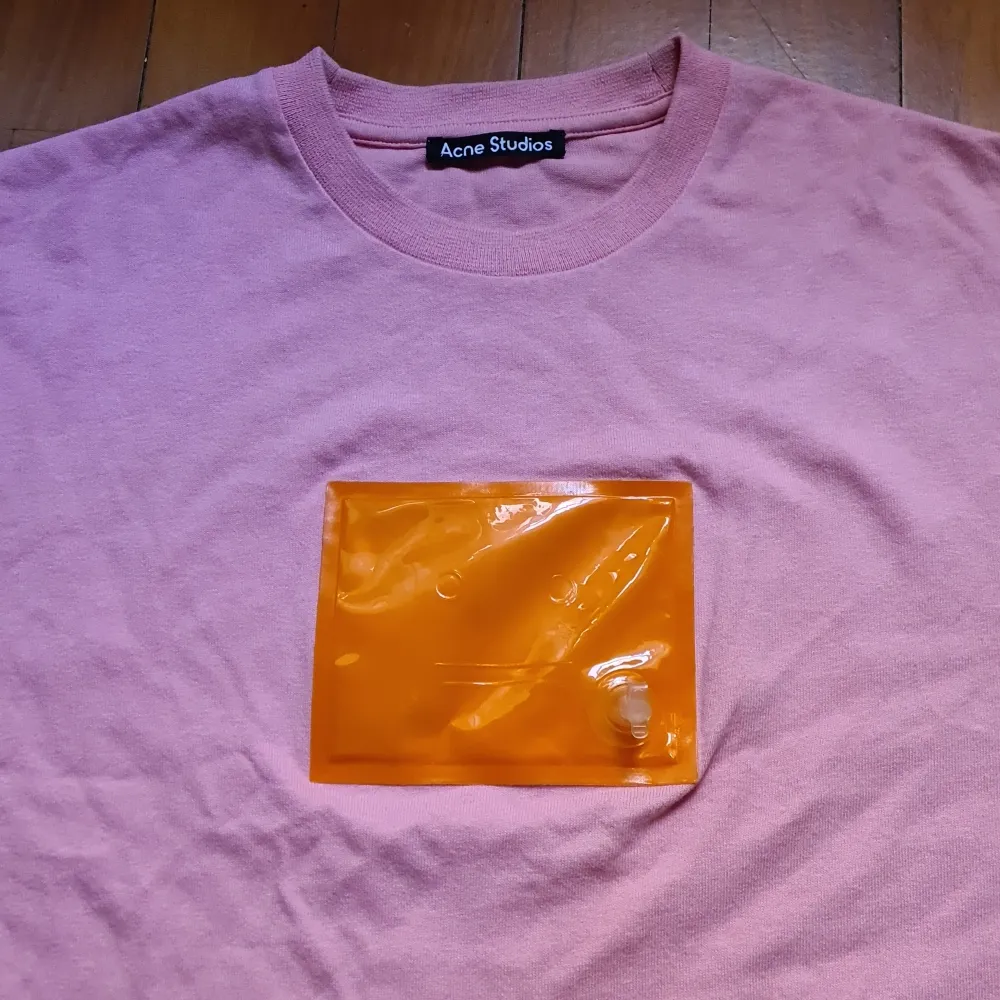 Bubblegum pink Acne Studios tshirt with orange face logo detail front. Bought at sample sale, but very good condition! . T-shirts.