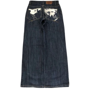 Vintage baggy Rocawear jeans - Vintage baggy jeans från 90-tals märket Rocawear. Storlek 30x34, benöppning 24,5cm. Använd gärna köp nu!