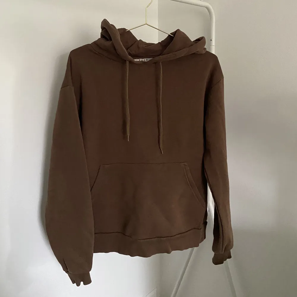 En brun hoodie från NA-KD. Storlek S. . Hoodies.
