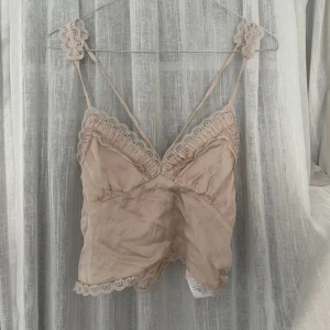 Topp - Skit gulligt linne passar även Xs