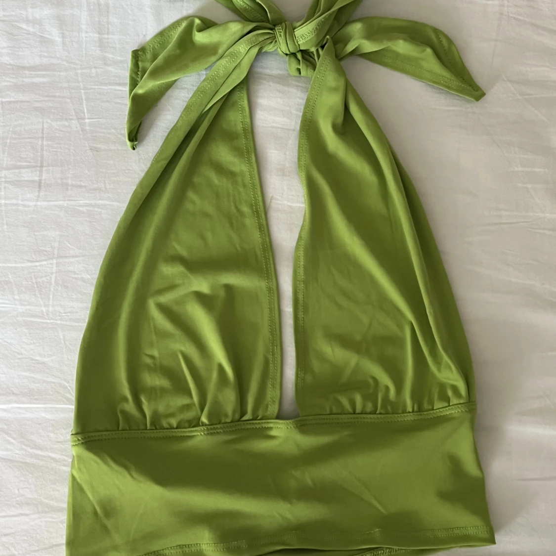 Nelly halternecktopp  - 90