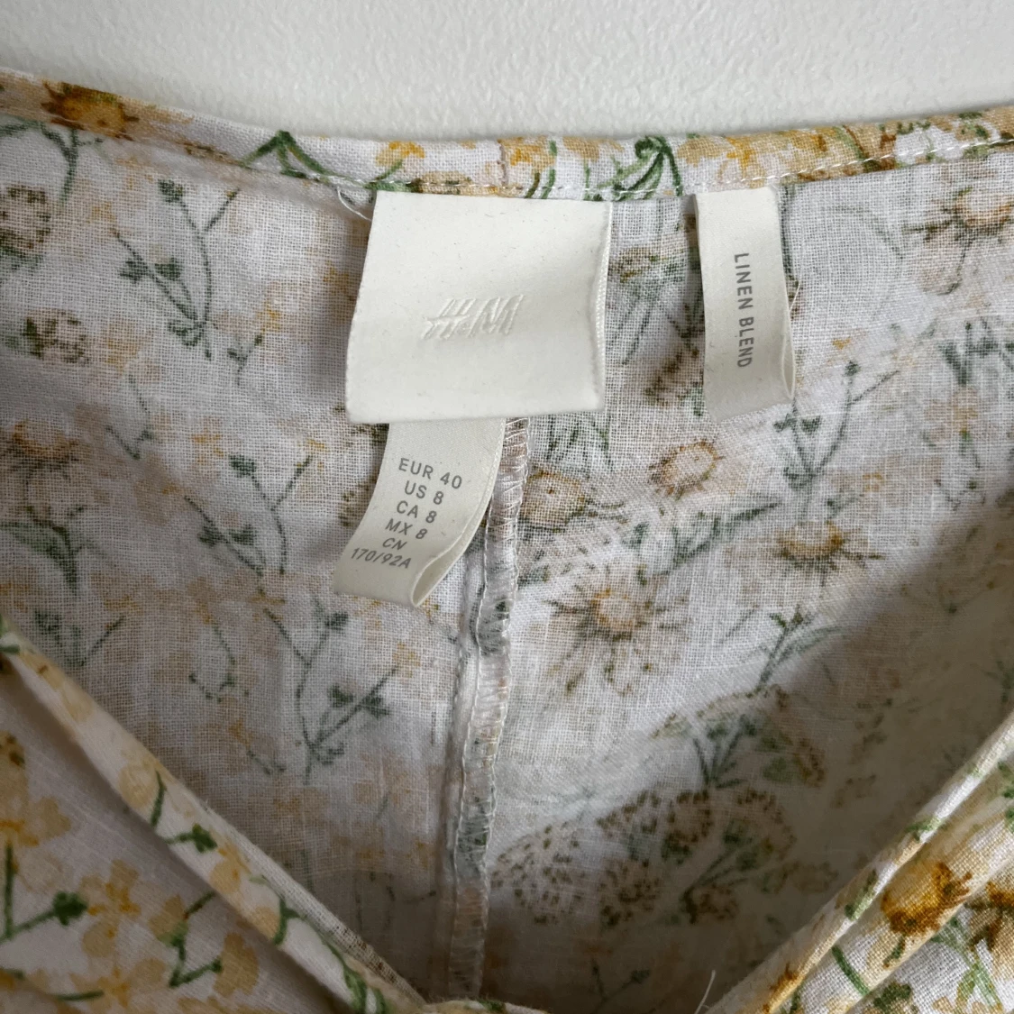 blommig linneklänning - 90