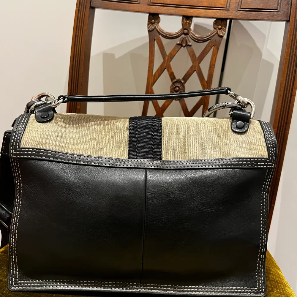 Crossbody Diesel bag- leather elements The flap material is distressed, this is an original feature  I love how it fits everything but not my style anymore. . Accessoarer.