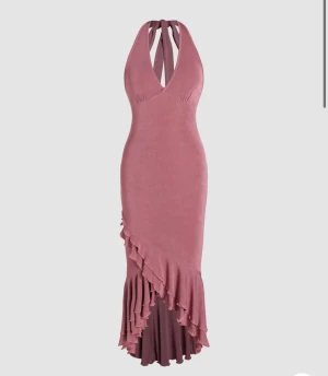 Klänning  - Helt ny och  oanvänd, säljer för att jag inte kan lämna tillbaka den.  Väldigt stretchig, funkar som M också. 