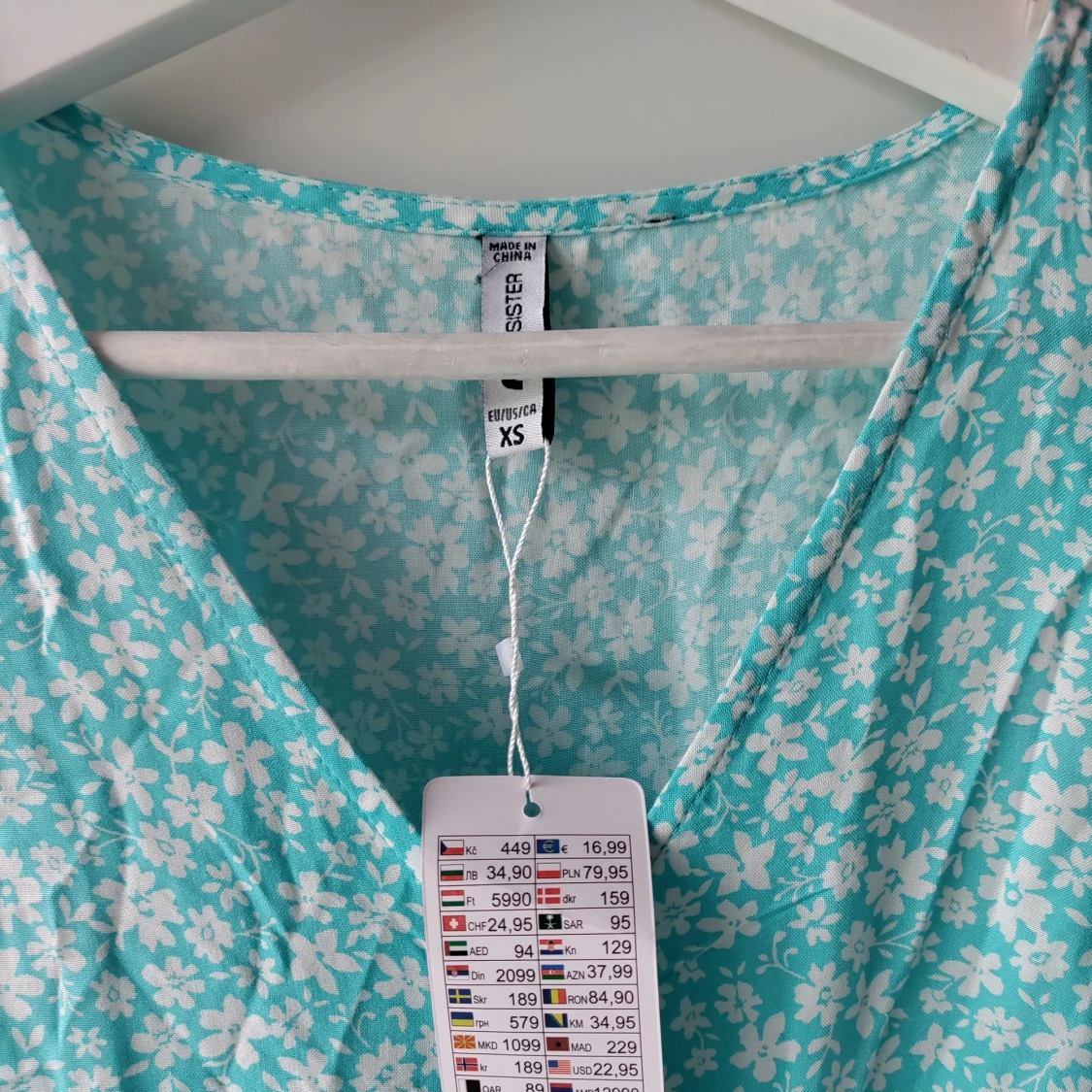 Blå blommig playsuit - 90