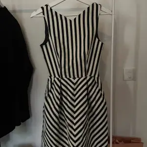 A blacknwhite dress from ZARA.  Condition: New- never worn. Size: XS