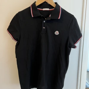 Moncler piké - Moncler piké svart använd 