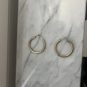 Guld hoop - Aldrig använd 
