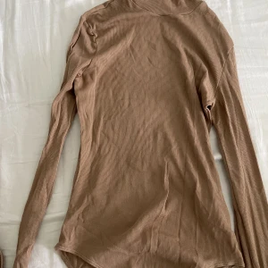 Beige body HM - Beige body från HM, oanvänd pga passar inte mig.