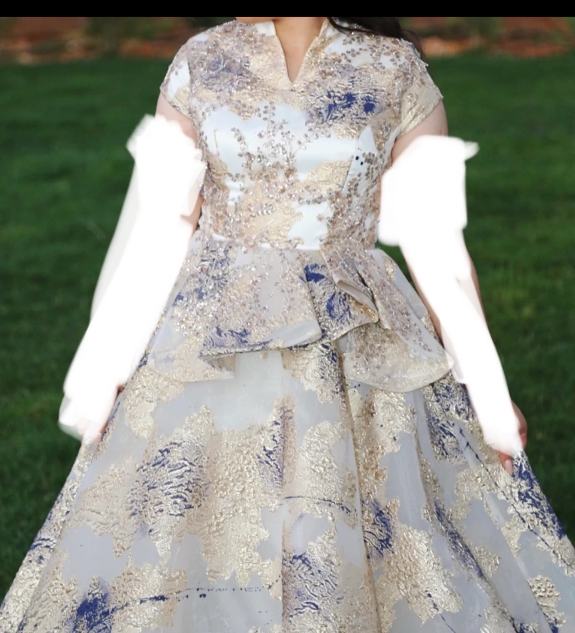 A special designed dress by In Couture by Kiwi (royalty Dress)