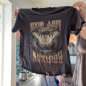 Tshirt  - Väl använd men i bra skick!