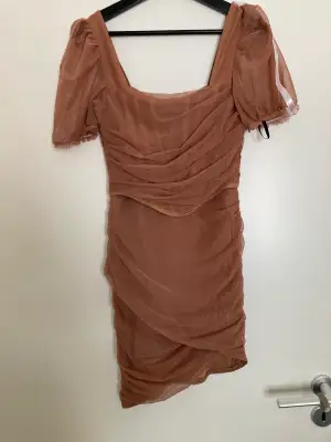 Supeeeerfin klänning från missguided med korsett detalj och tättsittande fit! Endast provat och lappen finns kvar.