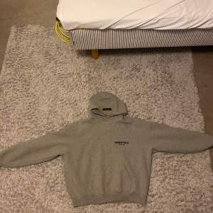 Grey essentials hoodie size M no holes or rips washed and no stains