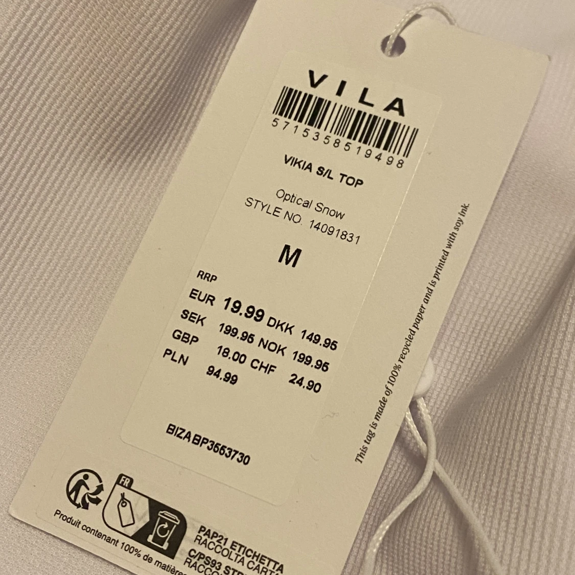 ÄRMLÖS V-RINGAD TOPP - 91